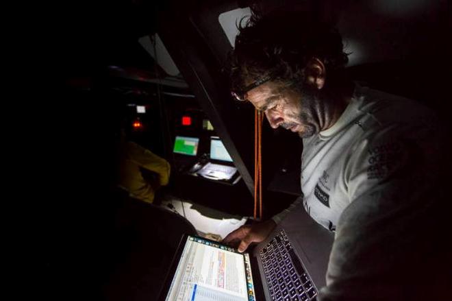 Onboard Abu Dhabi Ocean Racing – Roberto Bermudez 'Chuny' reads an email from his family in the darkness below just after the sun goes down on deck - Leg six to Newport – Volvo Ocean Race © Matt Knighton/Abu Dhabi Ocean Racing